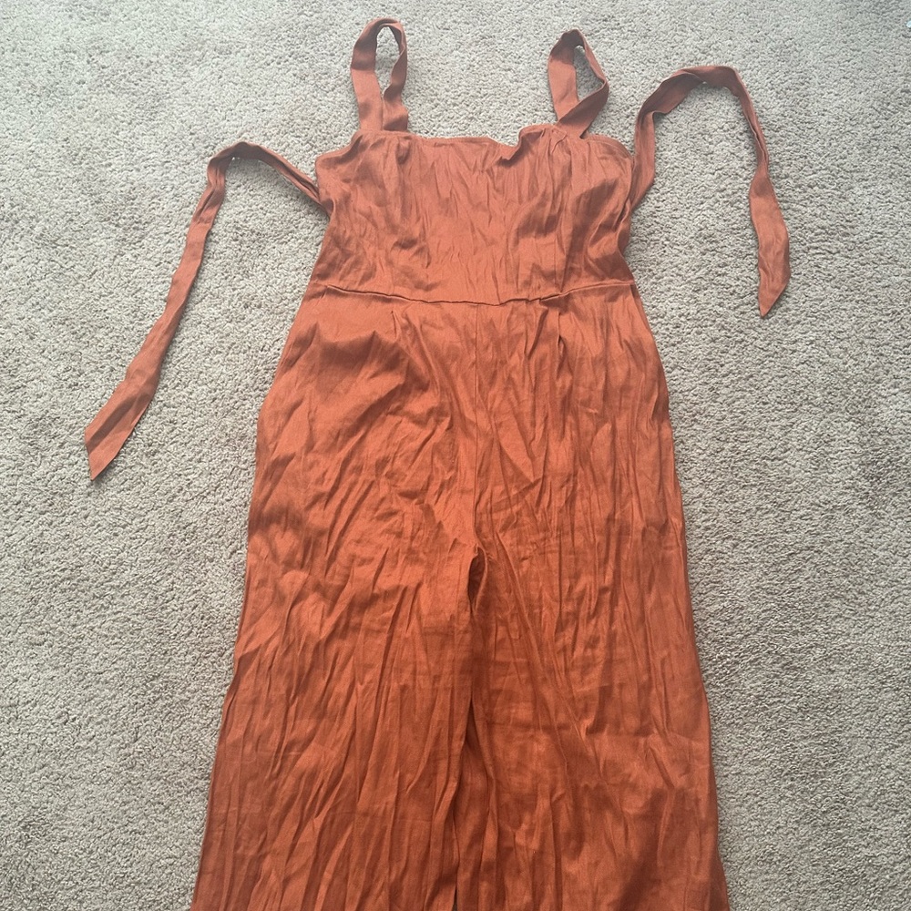 Women's burnt orange/rust cropped jumpsuit with tie back and wide straps